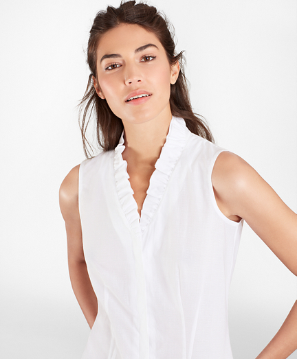 white blouse with ruffle neck