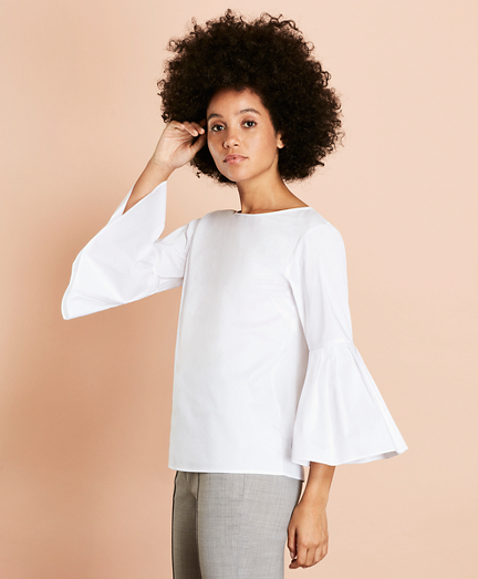 white blouse with flowy sleeves