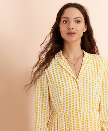 yellow and white polka dot shirt