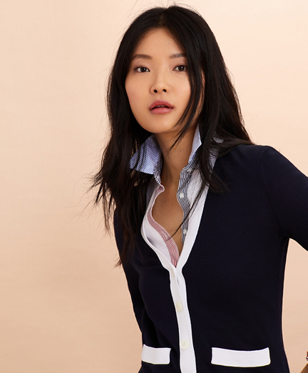 white cardigan with black trim